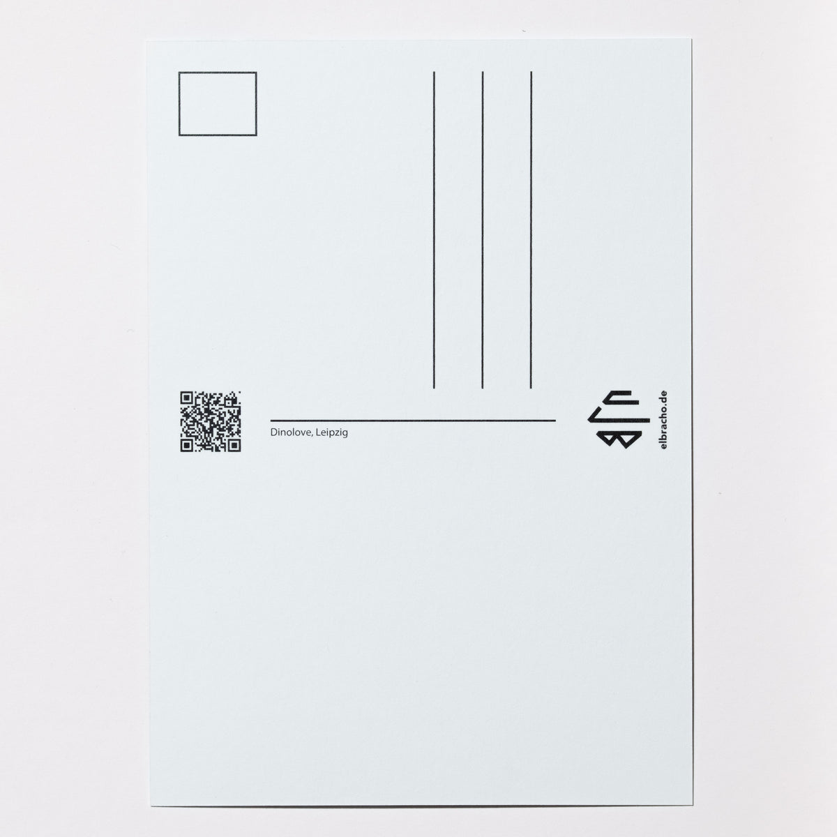 Rückseite der elbracho Postkarte 'Dinolove, Leipzig' mit Adressfeld und QR-Code